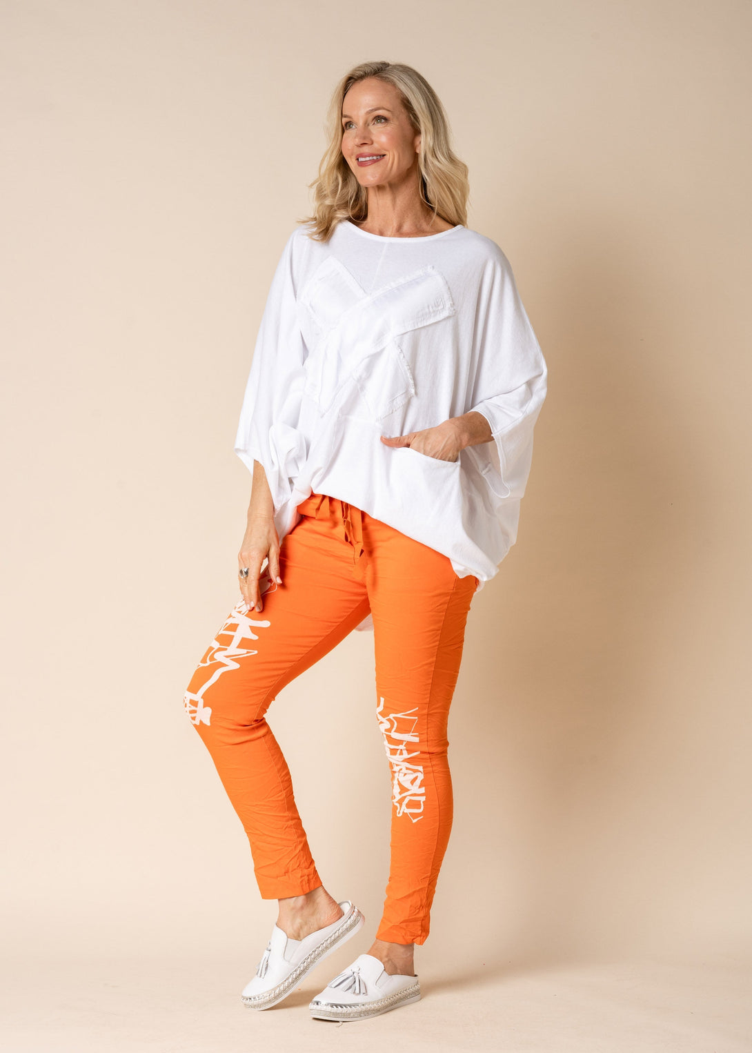 Lorali Pants in Sunset Orange